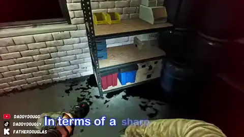 Responder swinging a two-hand melee weapon in a dark interior